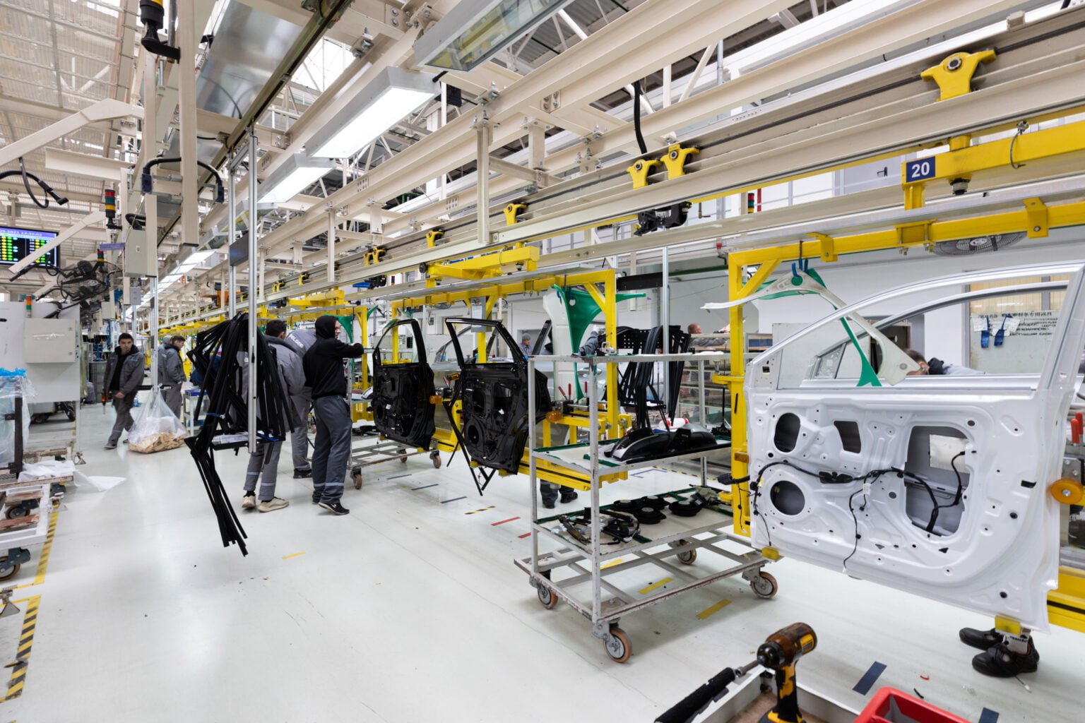 Modern car assembly plant. Auto industry. Interior of a high-tech factory, modern production.